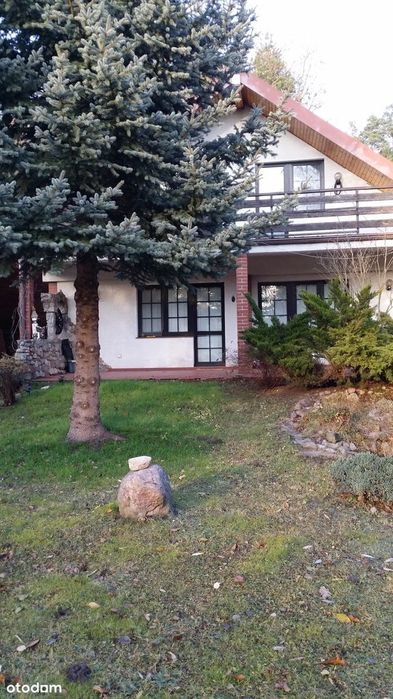 Całoroczny dom z ogrodem nad zalewem na granicy lasu