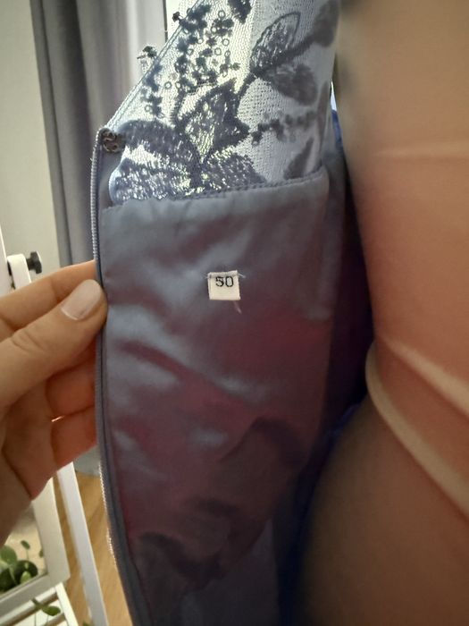 Niebieska sukienka rozmiar 50