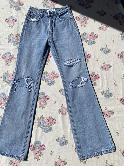 Jeansy z dziurami szerokie dzwony XS 34 stradivarius typu flare