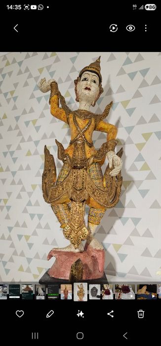 Rosto de Budda e estatua de bailarina tailandesa e soldado tarracota