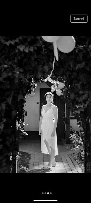 Elegancka biała midi sukienka