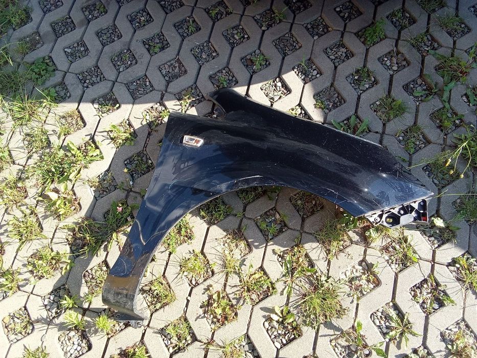 KL BŁOTNIK PRAWY PRZÓD OPEL CORSA D 06- 5D