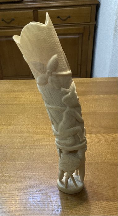 Escultura em material nobre
