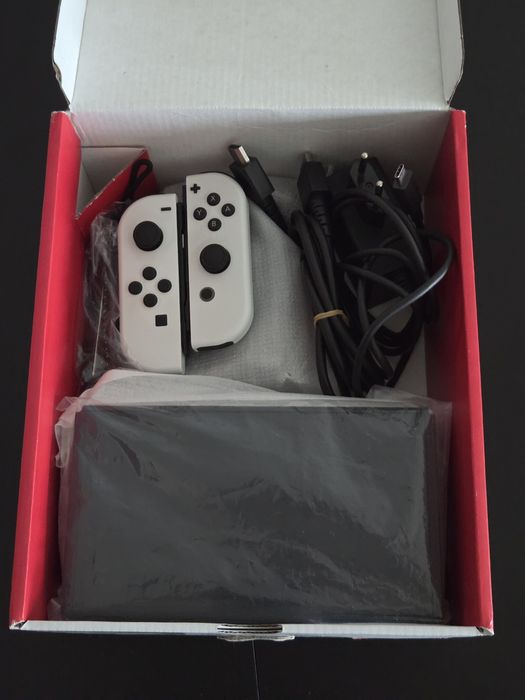 Nintendo Switch OLED desbloqueada 128gb 

Consola pronta a jogar, com