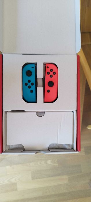Nintendo Switch Oled + Ring Fit Adventure