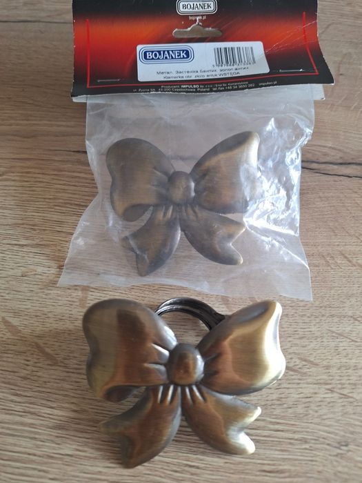 Звтискач бант на штори