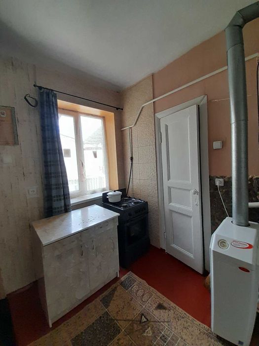 Продам добротный кирпичный дом в Люботине на два входа