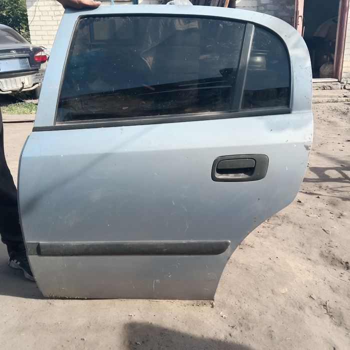 Продам двери Опель астра Джи