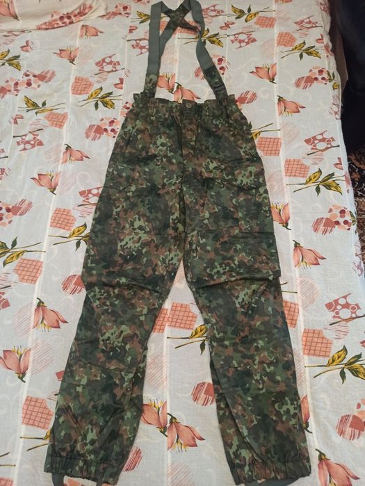 Продам полукомбинезон утеплённый р-50рост4