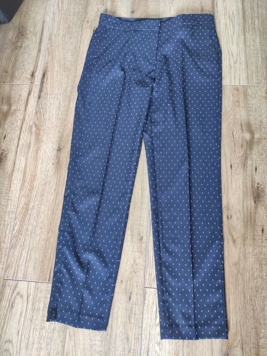 Eleganckie  granatowe w białe paseczki  spodnie damskie rozm. 40/42