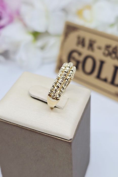Złoty pierścionek diamentowane kulki próba 585 14k