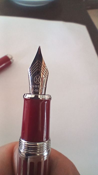 Caneta de tinta permanente como nova - Oferta de portes de envio