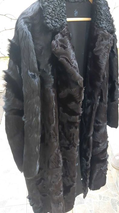 Casaco de pele genuina , cor preta