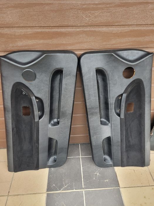 Boczki drzwi tapicerki Bmw e36 Coupe komplet