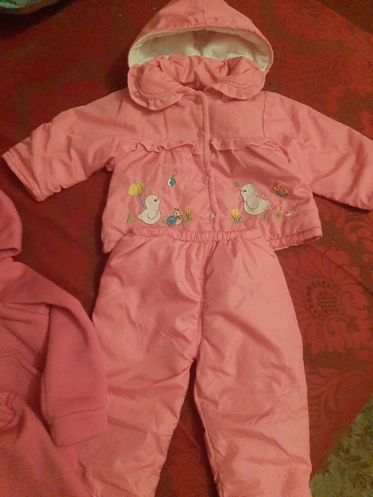 Дитячі, зимові комбінезони.