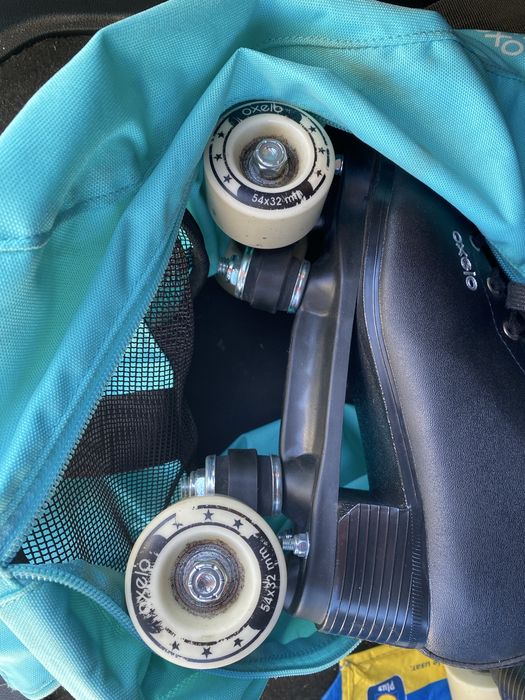 Patins pretos com saco