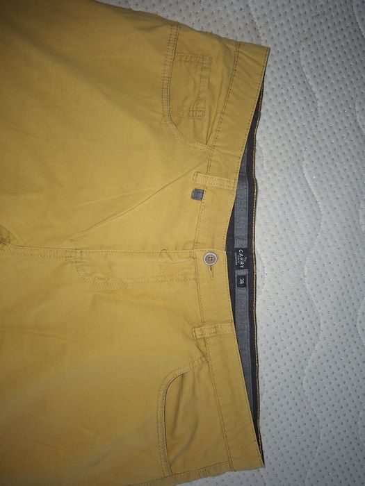 Męskie, żółte krótkie spodenki r. 38 Carry