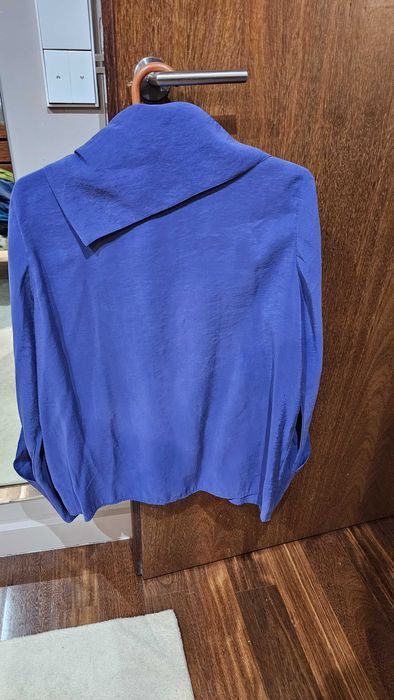 Camisa com gola larga