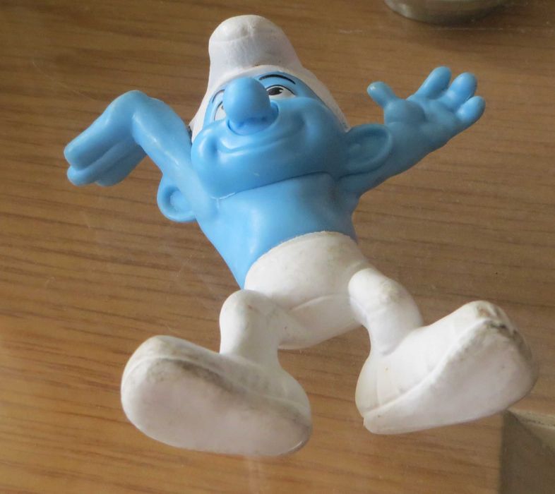 Brinquedos  Boneco Smurfs + oferta Filme DVD Super Heróis O Filme