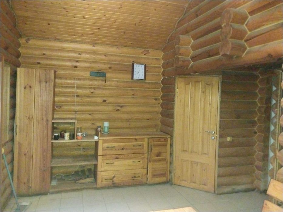 Дерев'яна баня зі зрубу розміром 5,6 м * 5,6 м