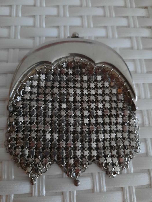 Vendo porta moedas, muito antigo.