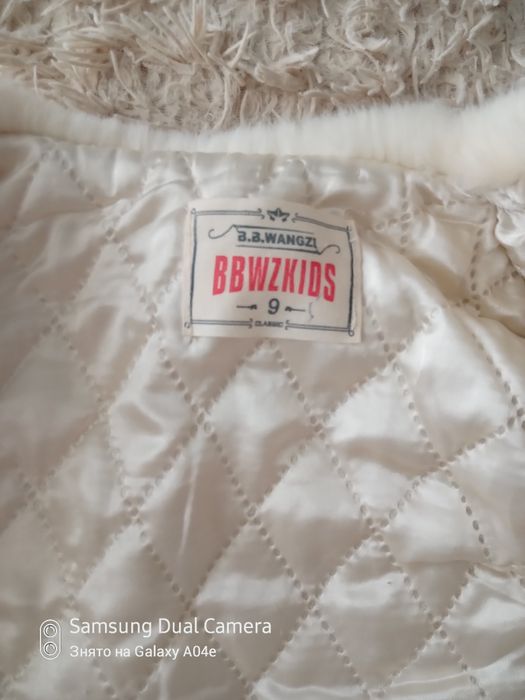 Біленька шубка  для дівчинки