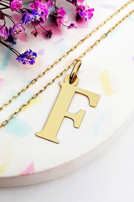 Złota zawieszka do łańcuszka litera F pr.585