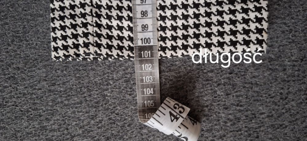 Spodnie w czarno białą pepitkę 44/46r