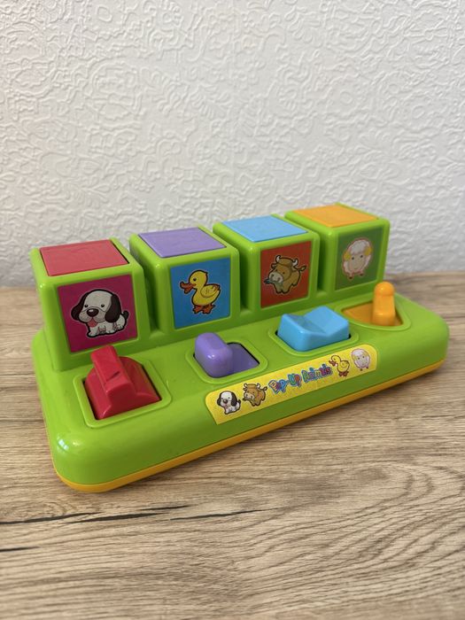 Розвиваюча іграшка моторика відкриття сюрприз