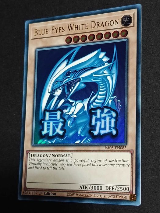 *Novo Set* Yu-Gi-Oh! 1.ª Edição 'Blue-Eyes White Dragon' (V.1 - Stramped Ultra Rare) - RA05-085 - Rarity Collection 5 - Carta de 2026