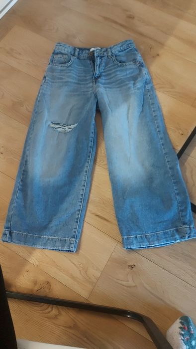 Spodnie jeans szerokie Reseved dziury 146