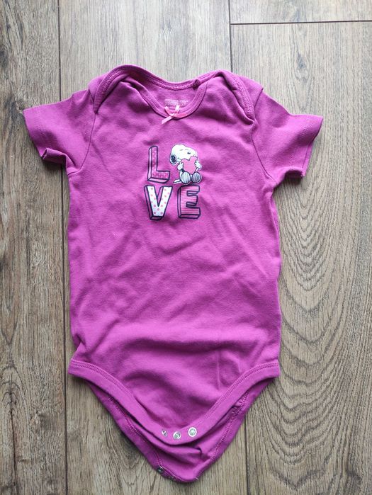 Body z krótkim rękawem. Rozmiar z metki 86. Stan idealny.