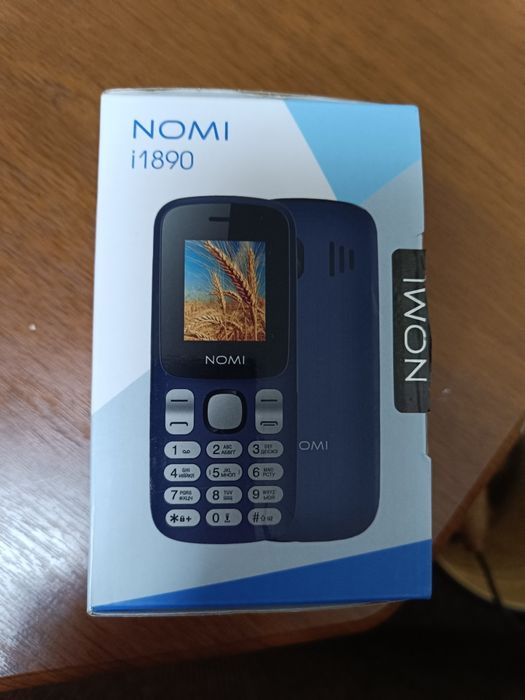 Продам новый телефон Nomi i1890,