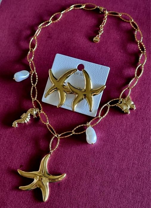 Conjunto dourado (colar e brincos), em aço, da estrela do mar