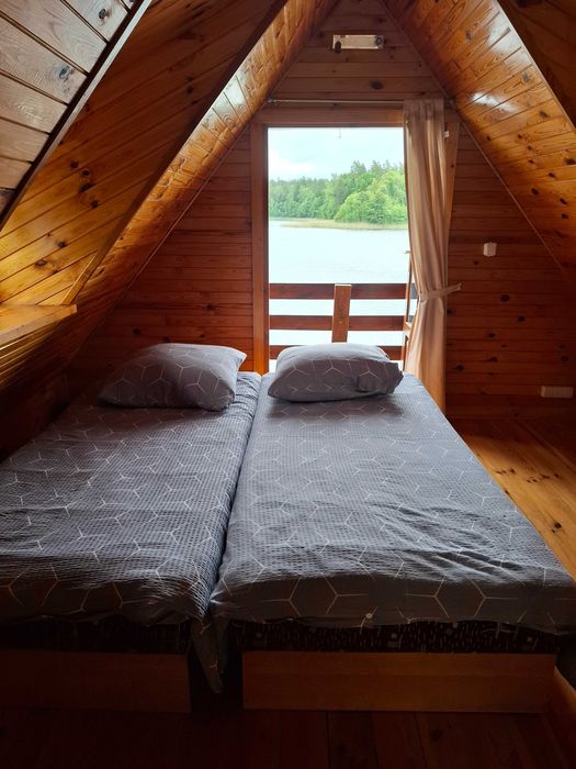 Przytulny drewniany domek + SAUNA nad jeziorem