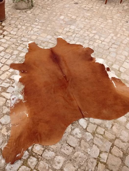 Pele de vaca (tapete)