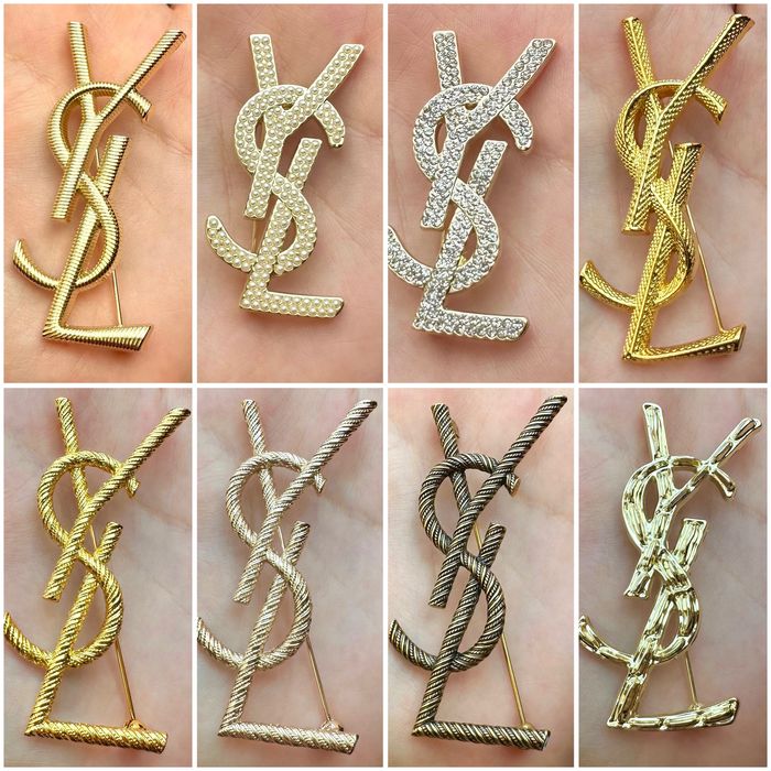 Broszka YSL złota metaliczna 6,7 cm