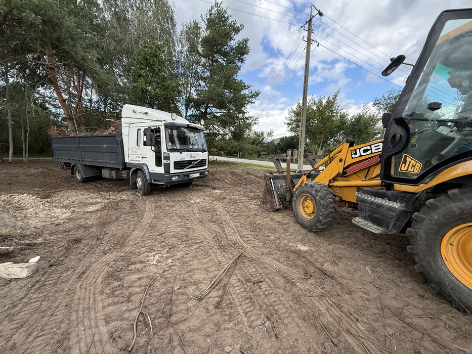 Odbiór gruzu gałęzi koparko ładowarka