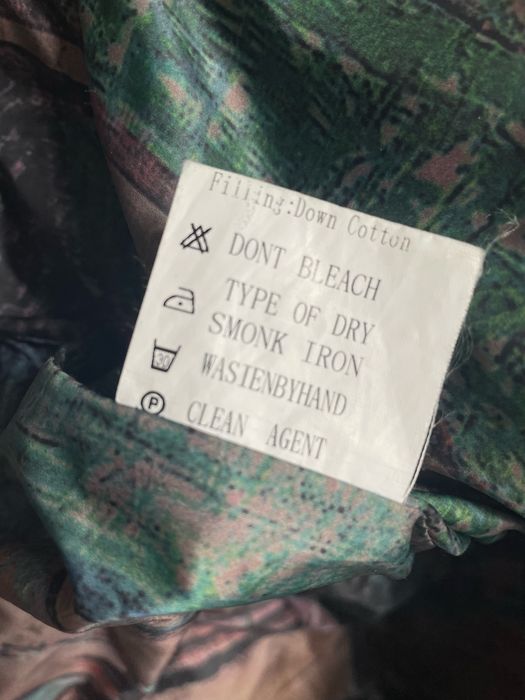 Стильний пуховик  Rufuete