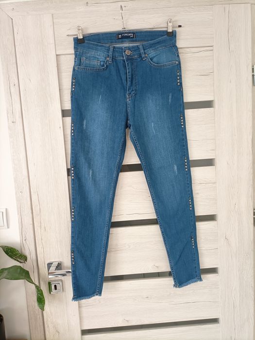 Nowe spodnie jeansowe z wysokim stanem dopasowane S/36 niebieskie