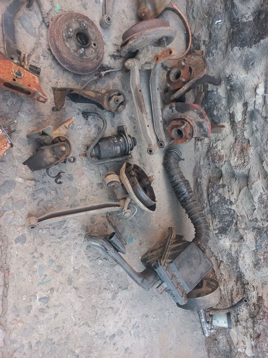 Подушки, ричаги, патрубки  Ніссан санні