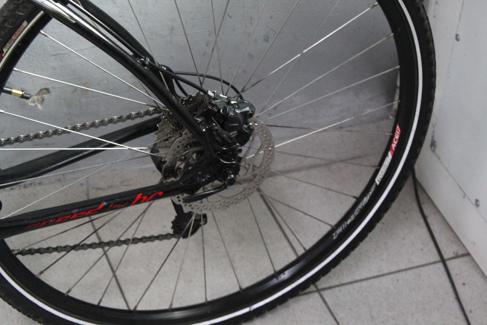 Rower crossowy HardRock, Rama 18,5", Koła 28" Alu, Amor Shimano Deore, Lekki