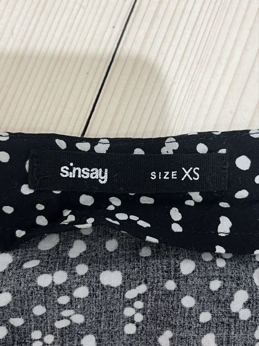 Wzorzysty czarno-biały kombinezon Sinsay