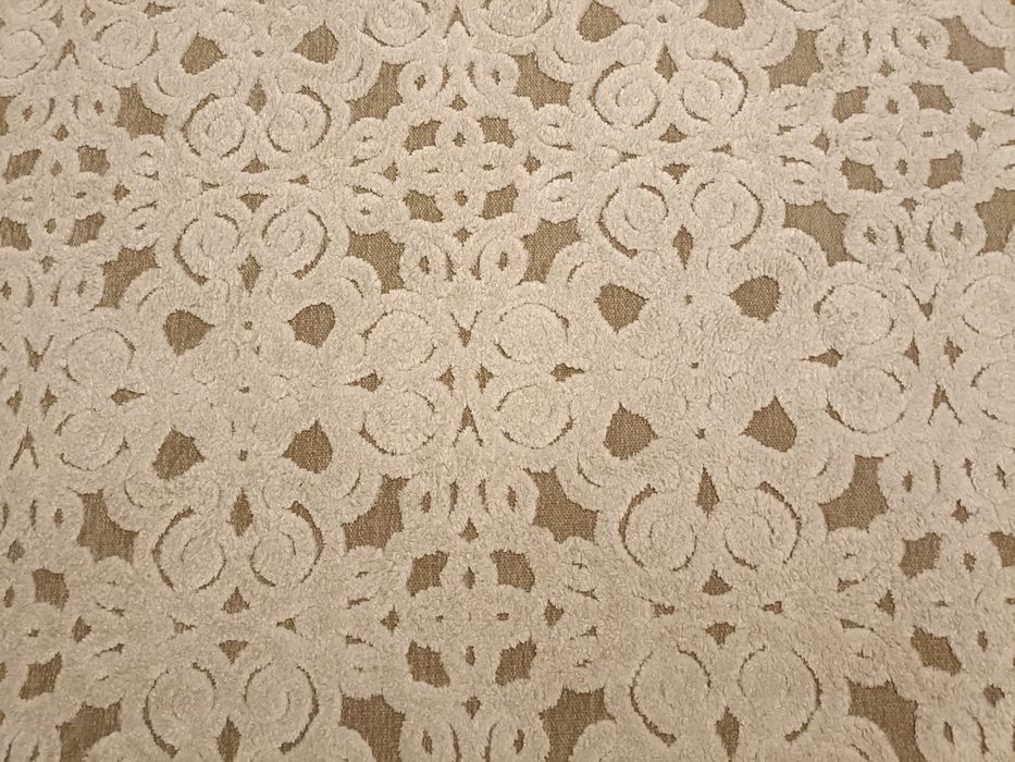 Carpete em tons bege, que se adapta a qualquer decoração