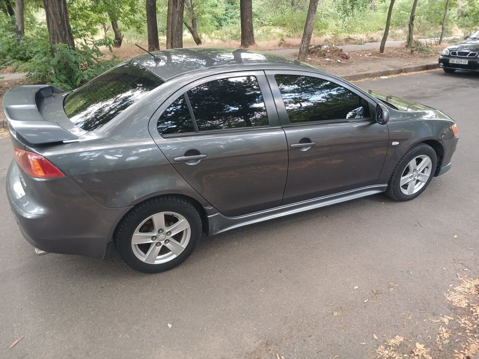 Продам lancer 2.0 акпп газ /бензин