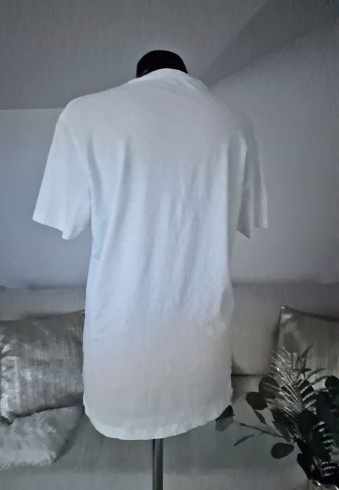 T- shirt bialy:Calvin Klein".