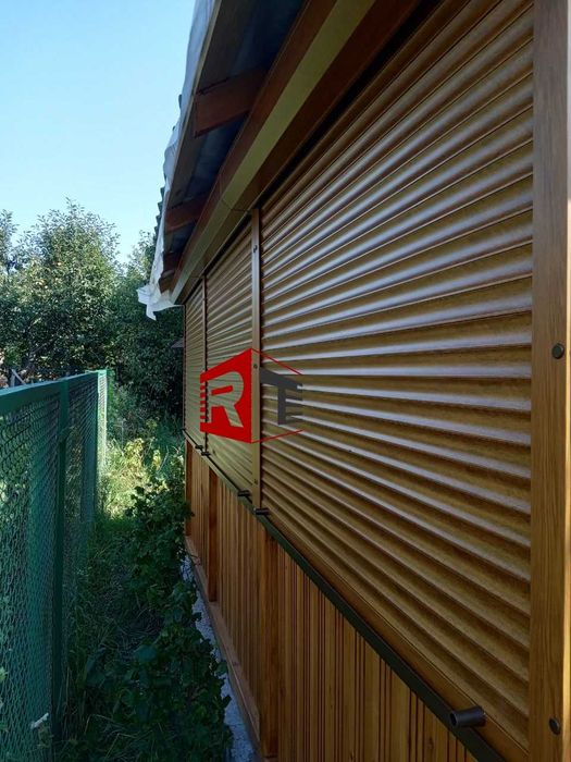 Ролети захисні зовнішні. Рольставні. Дверні ролети. Гаражні ролети