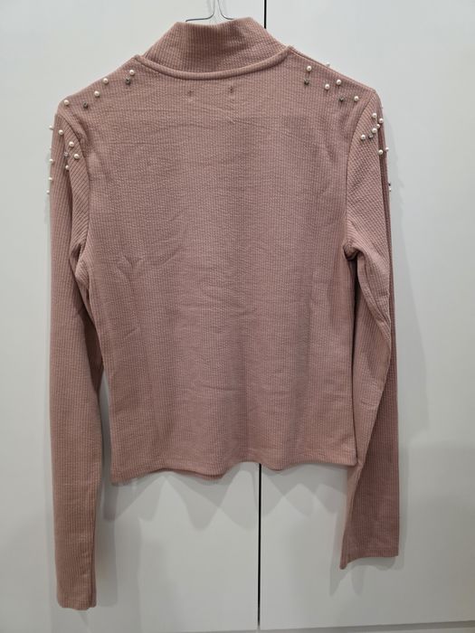 Camisola cor de rosa com pérolas