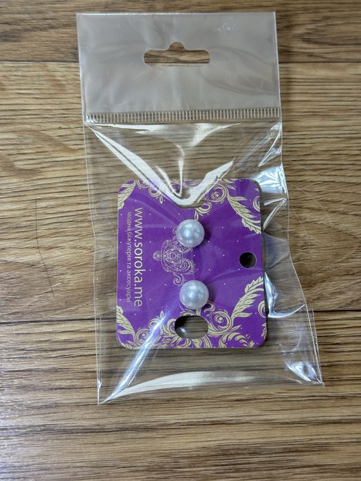 Сережки нові