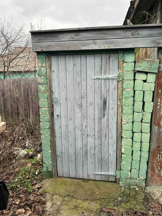 Пів будинку в центрі Баришівки